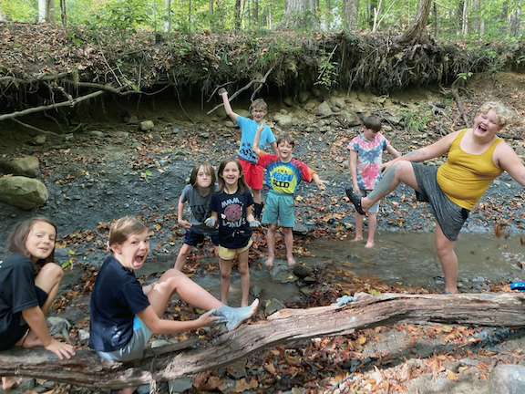 The Chagrin Valley Learning Collective enjoys times in the creek.